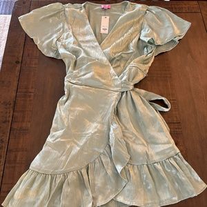 Women's mint green wrap dress size medium.